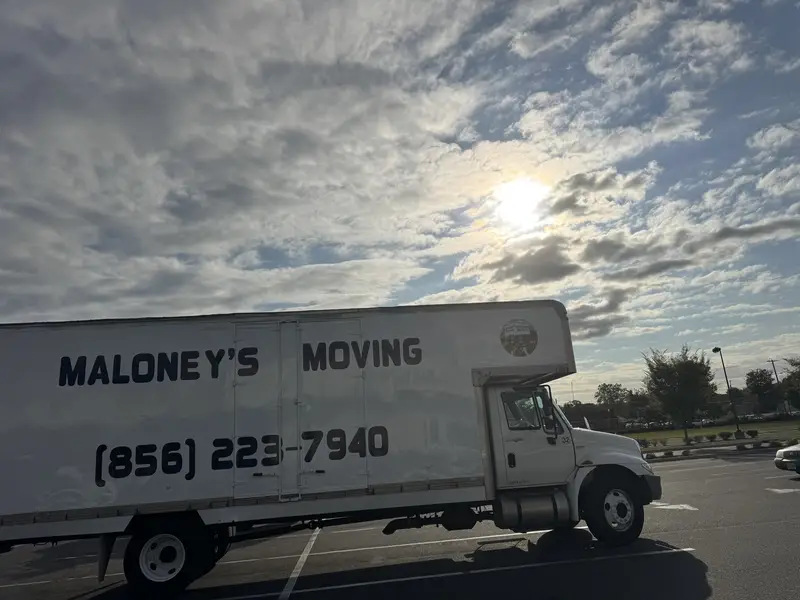 Professional Maloney's Moving team working together in South Jersey
