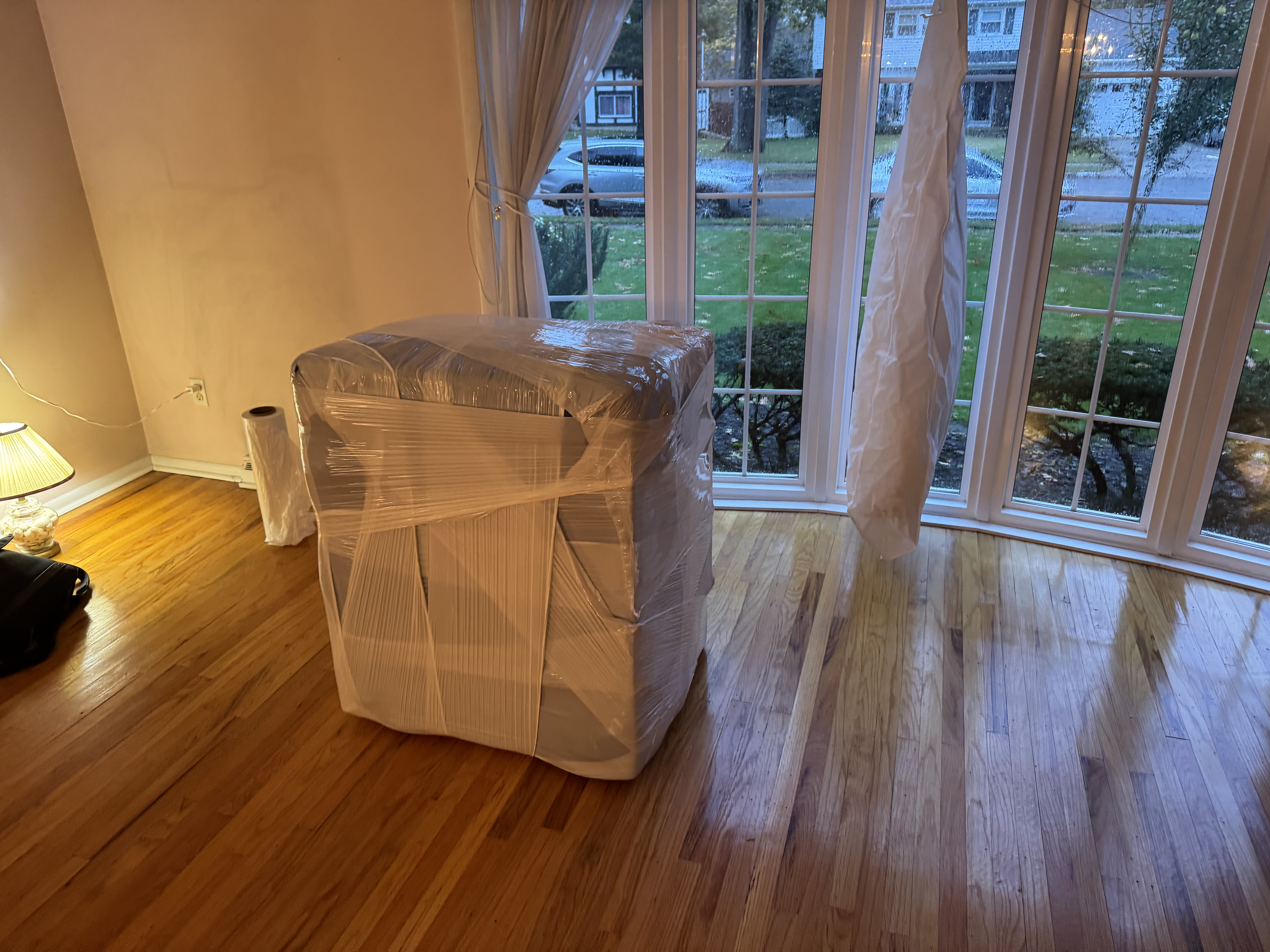 Carefully wrapped furniture near windows - Maloney's Moving South Jersey packing service