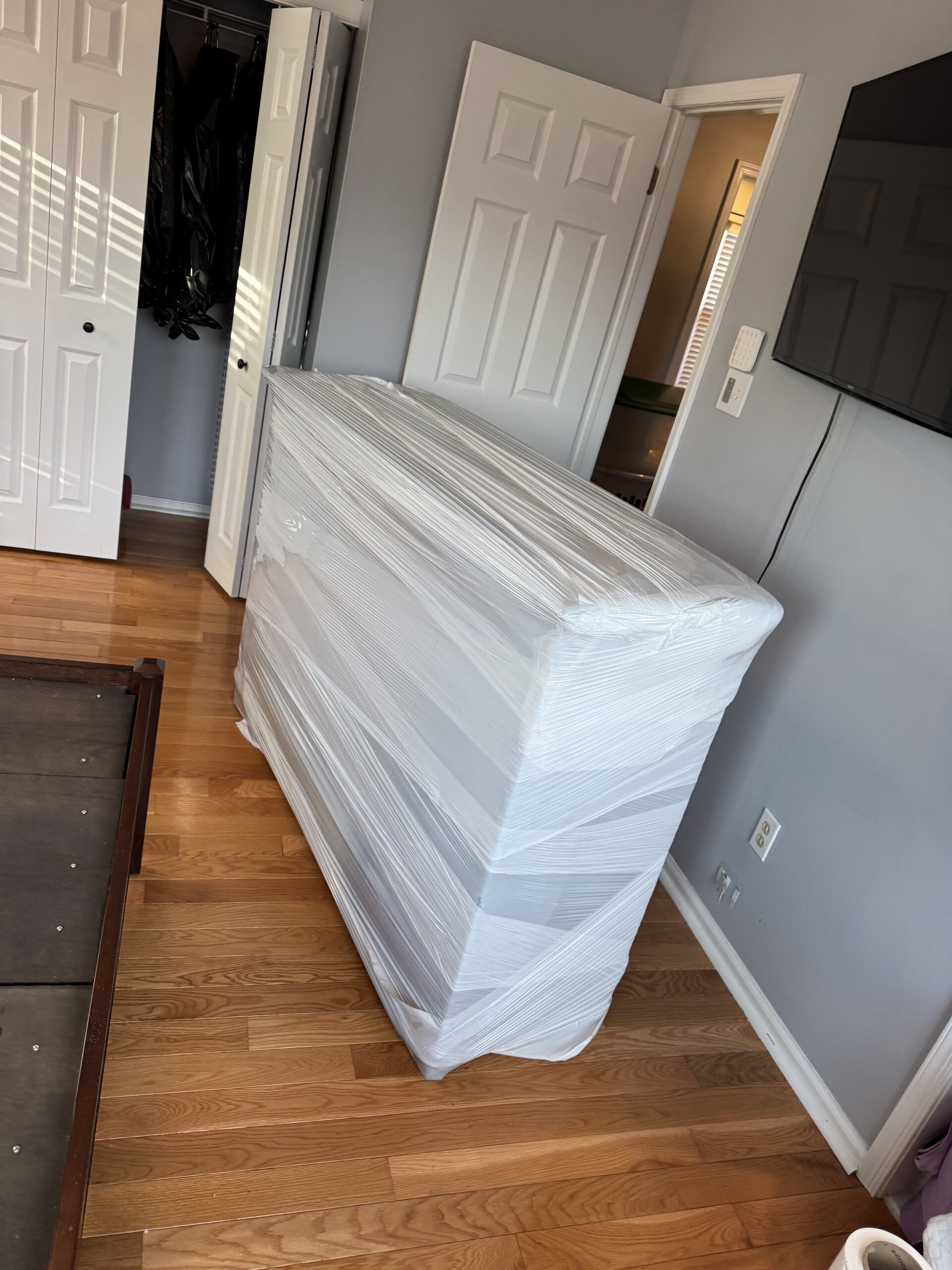 Professional furniture handling in Runnemede by trained South Jersey movers ensuring safe transport of household items Runnemede NJ licensed movers carefully handling furniture with proper lifting techniques and complete padding protection during residential move