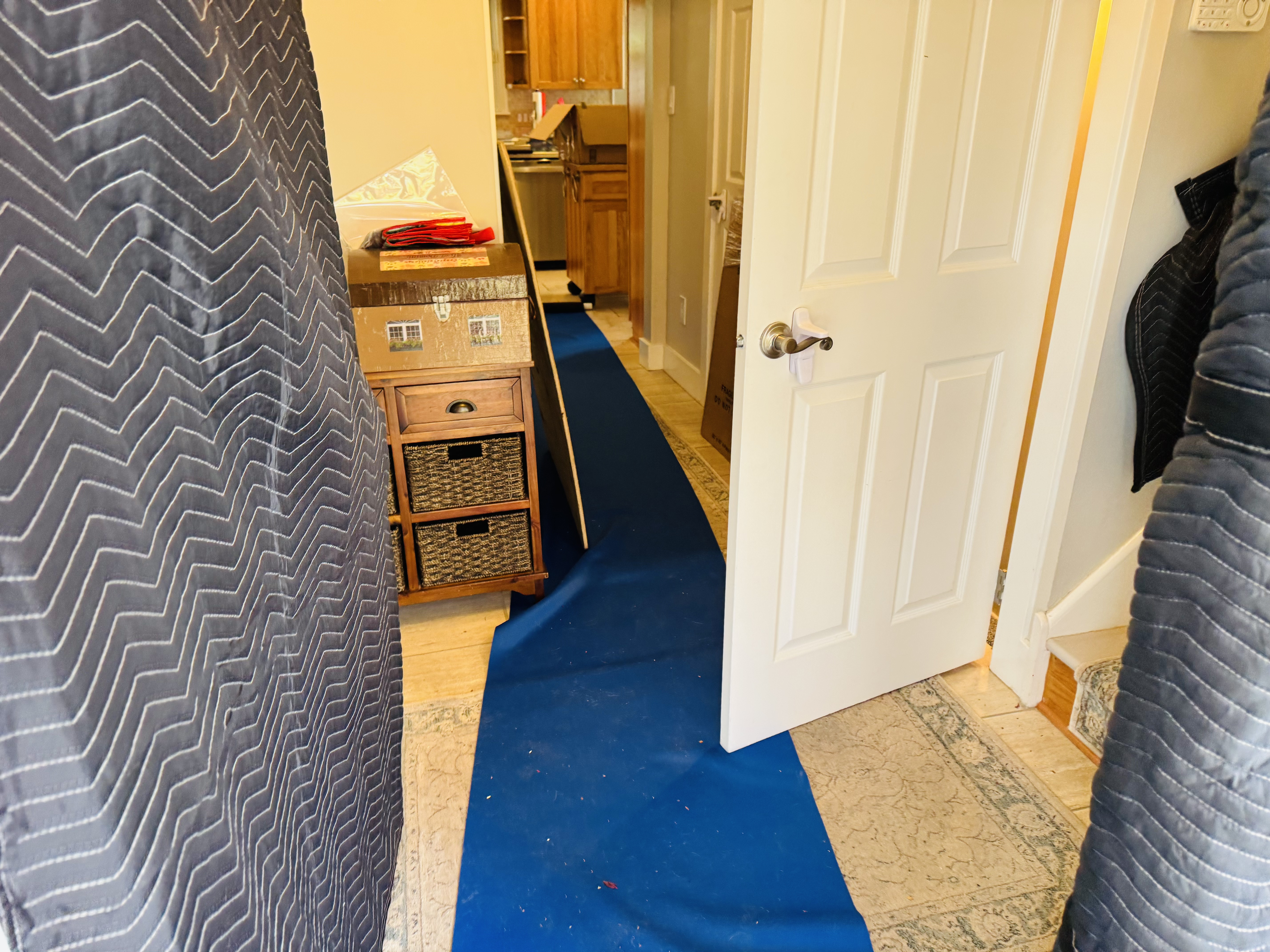 Secure furniture wrapping and protection by Maloney's Moving licensed professionals